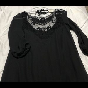 Black mini dress with lace detail